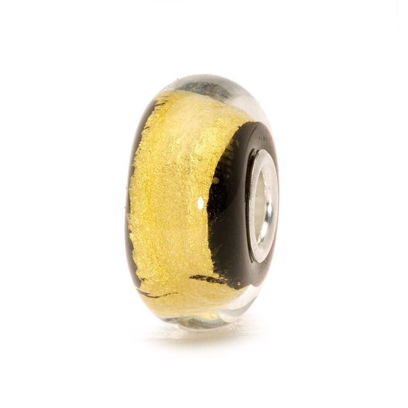 Breloque Trollbeads Or noir en verre noir avec bande d'or 22 carats, vue de côté sur fond blanc