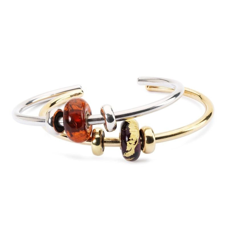 Perle Trollbeads Troisième œil avec une perle en ambre sur un bracelet Trollbeads combiné argent et 
