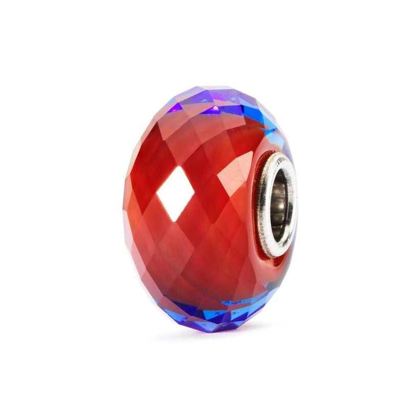 Perle Trollbeads Bijou du Sahara à facettes en verre avec surface facettée rouge et bleue et cœur en