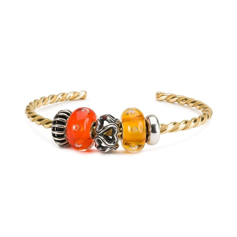 Bracelet Trollbeads avec perle SIENNA Bubble Joy en verre ambré et breloques orange et argent sur jo