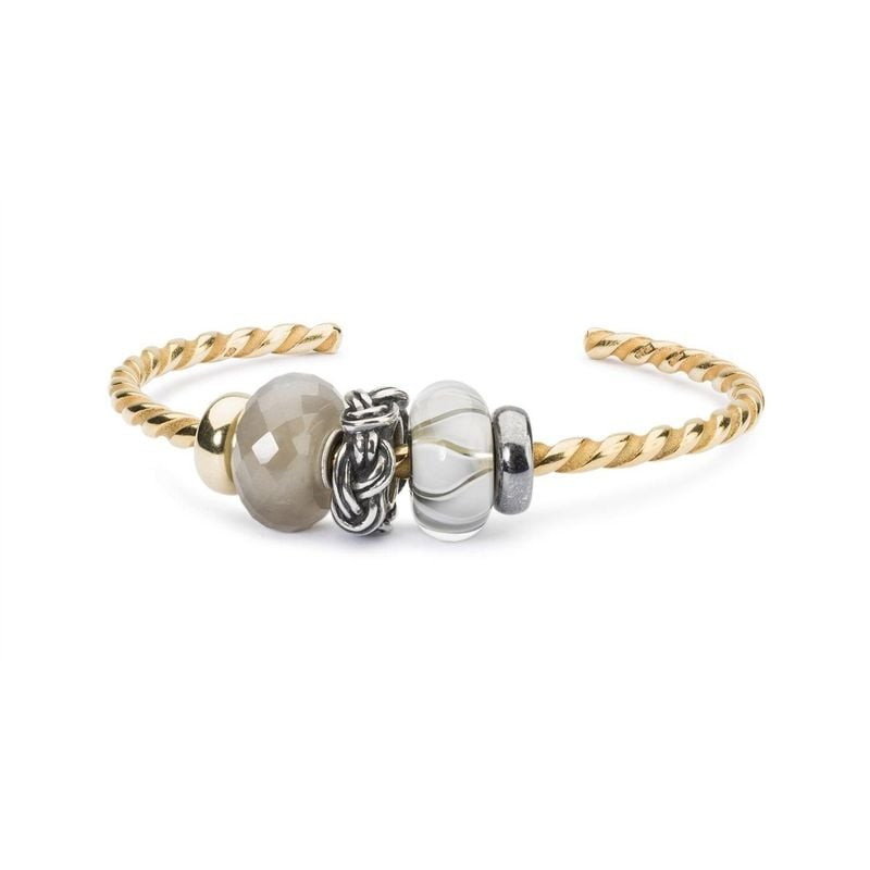 Perle Trollbeads Série Aurore Tulipe Verre Blanc sur bracelet Trollbeads, ambiance élégante et poéti