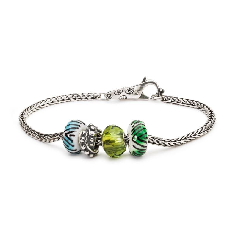 Perle Trollbeads Tigre de topaze sur bracelet argent tressé avec charms en verre tigre bleu et vert