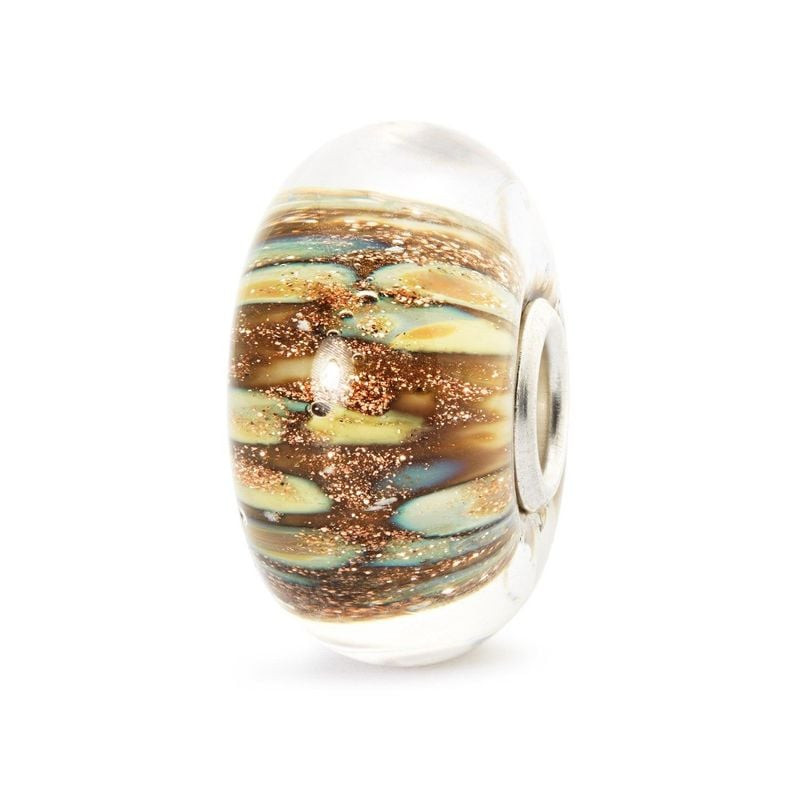 Perle Trollbeads Lampe Magique en verre, tons cuivrés terreux et reflets scintillants sur fond blanc