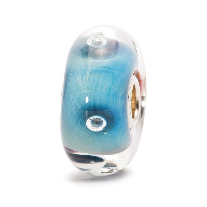 Perle Trollbeads Œil en verre de Murano, vue de profil, avec son cœur en argent massif et ses volute