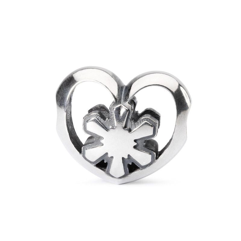 Perle Trollbeads Cœur de cristal en argent sterling avec motif flocon ajouré sur fond blanc