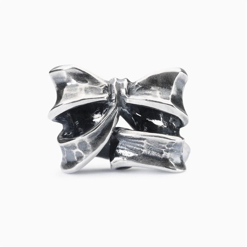 Packshot de la Perle Trollbeads Nœud Double Argenté, perle double en argent 925 avec motif nœud
