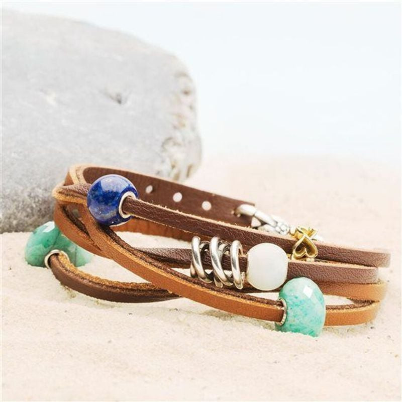 Ambiance mettant en scène la Perle Trollbeads Trois Frères Sœurs Argenté, un charme en argent 925 au