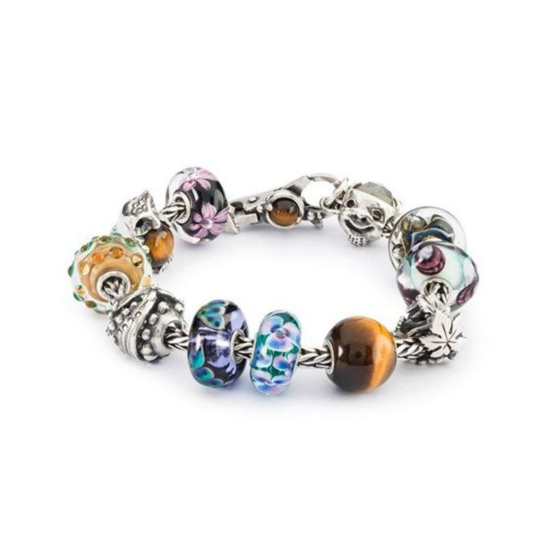 Bracelet à charms Trollbeads orné de perles de verre colorées, œil-de-tigre et charms en argent sur 