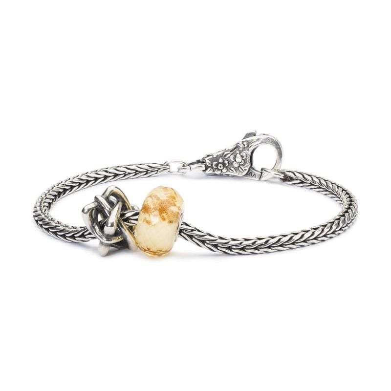 Bracelet Trollbeads en argent avec perle cœurs entrelacés, perle en verre ambre doré et fermoir