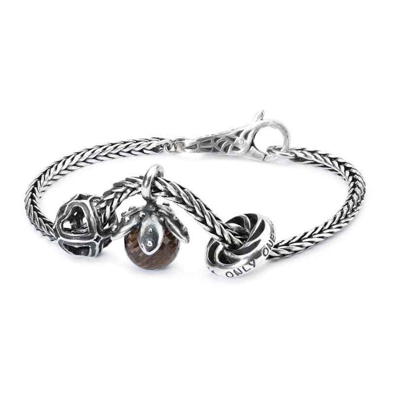 Bracelet en argent Trollbeads orné de la perle Symphonie de Cœurs et d'autres perles Trollbeads