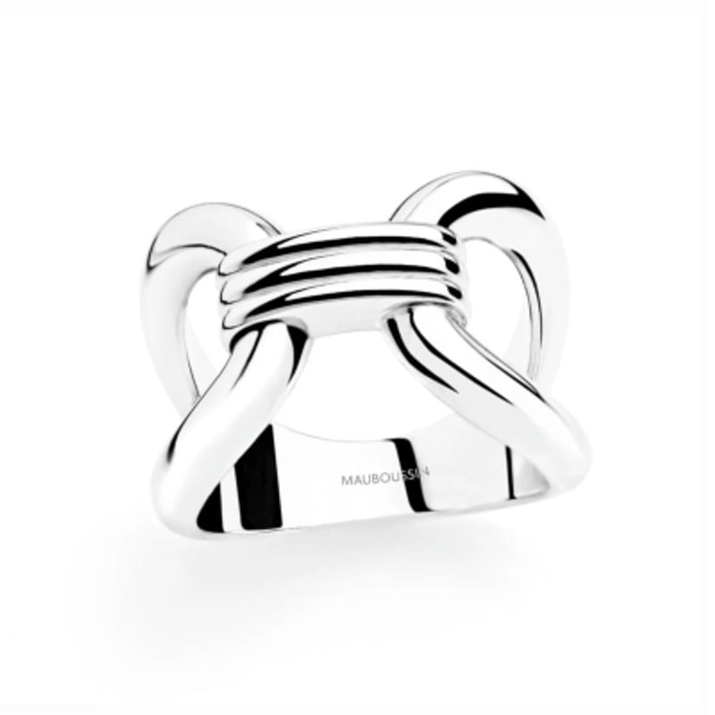 Bague Mauboussin en argent 925 rhodié, deux boucles entrelacées et lien triple central, gravée MAUBO