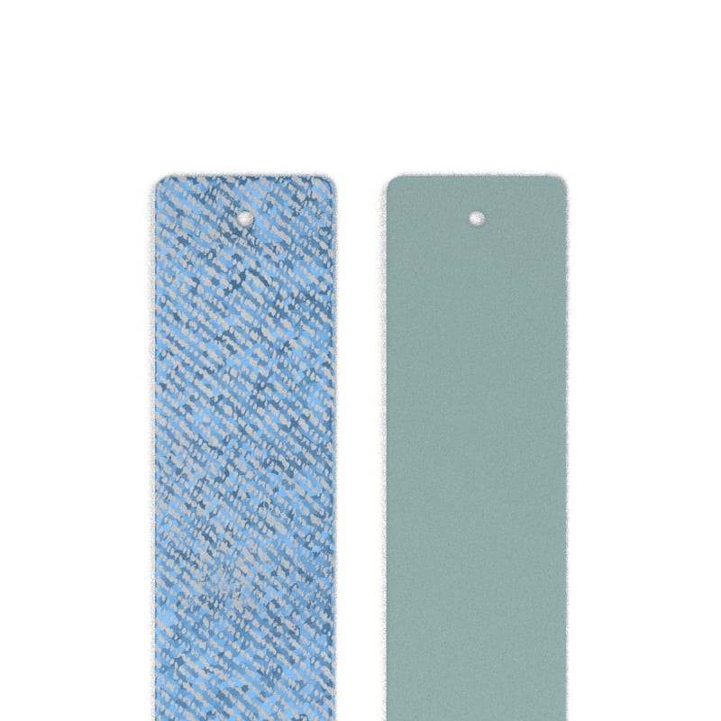 Insert en cuir réversible Les Georgettes 25 mm présenté à plat : face tissée denim irisé à côté du c