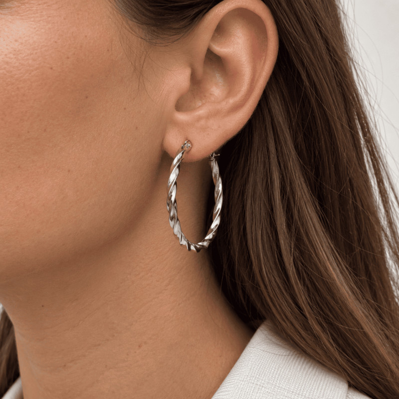 Boucles d’oreilles Amporelle Créoles torsadées en acier argenté 35 mm