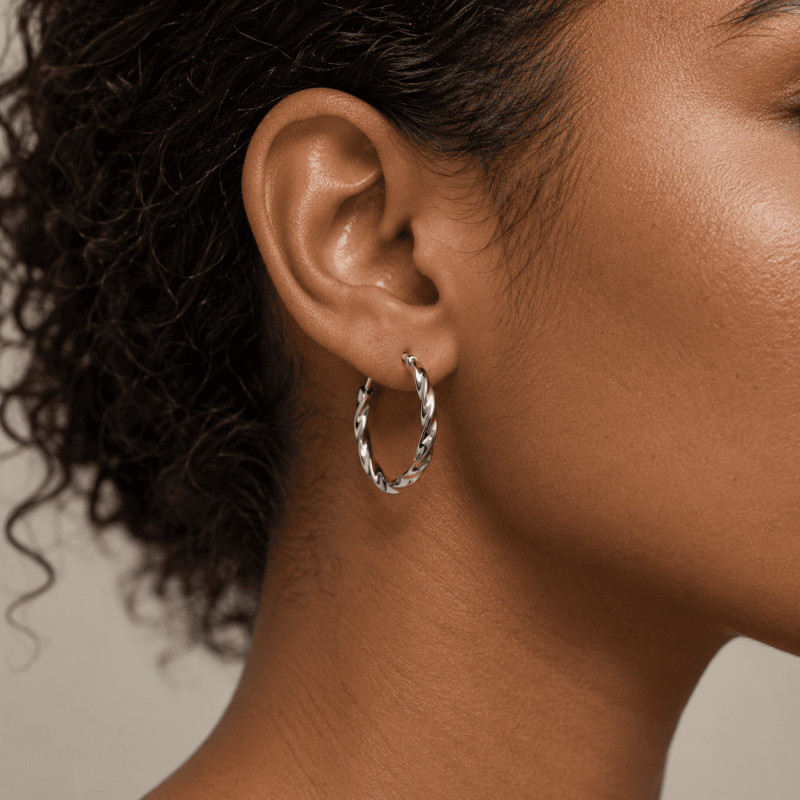 Boucles d'oreilles Créoles torsadées Amporelle en acier