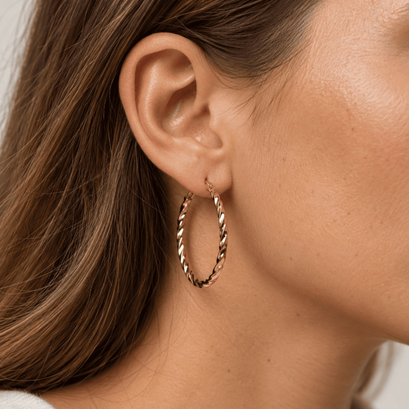 Boucles d'Oreilles Créoles torsadées Amporelle acier doré