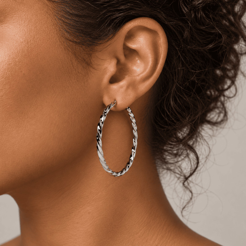Boucles d'oreilles Créoles torsadées Amporelle acier argenté