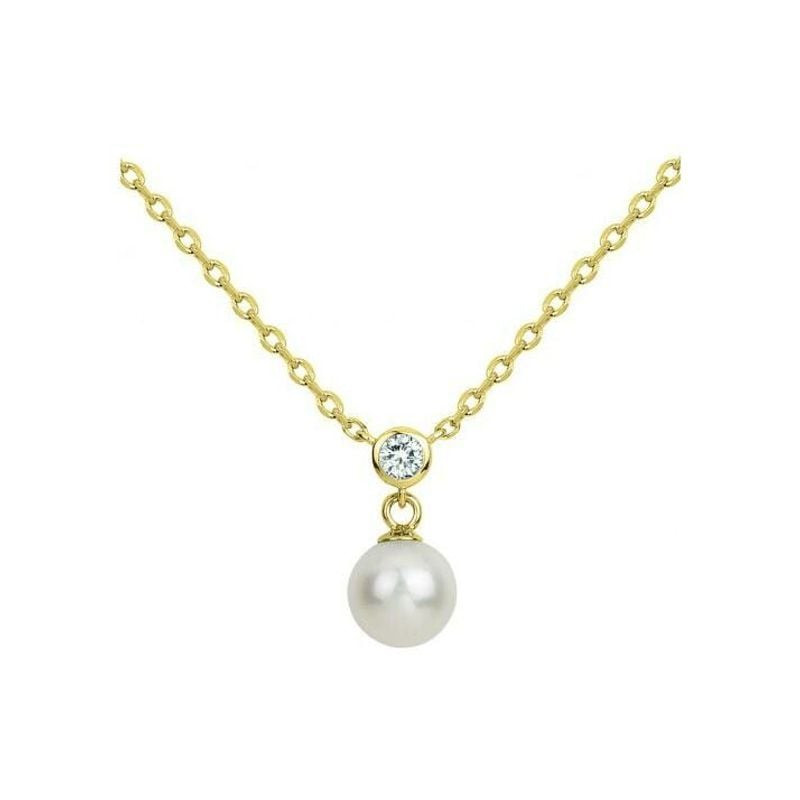 Collier PHEBUS plaqué or avec perle d'eau douce blanche et pendentif en zirconium blanc sur fond bla